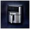 A sleek, modern stainless steel air fryer with a digital display showing '180°C' and '15:00' sits on a dark background.