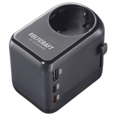 A black Voltcraft UC-2A45W01 power adapter with multiple port options, including USB and USB-C, sits upright, ready for use.