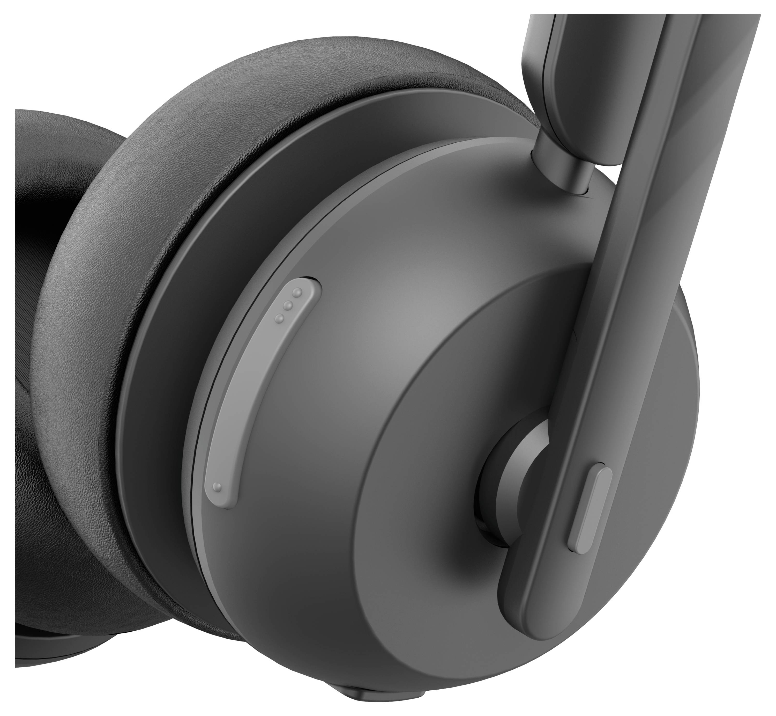 A close-up of a black over-ear headphone, highlighting the ear cup and adjustable headband. Suitable for listening to audio comfortably.