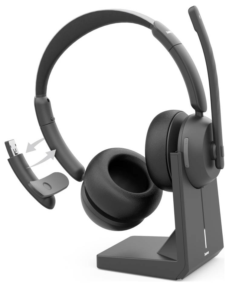 Wireless black headset on a charging stand, with a detachable earpiece shown beside it and arrows indicating how it connects.<br>