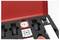 'A red box containing wheels and electronic components in foam cutouts, used for assembling a robot kit.'