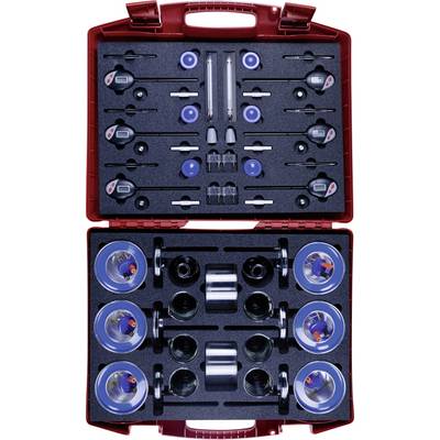 'A red case containing precision weight sets and calibration equipment, organized in compartments for measuring and calibration purposes.'