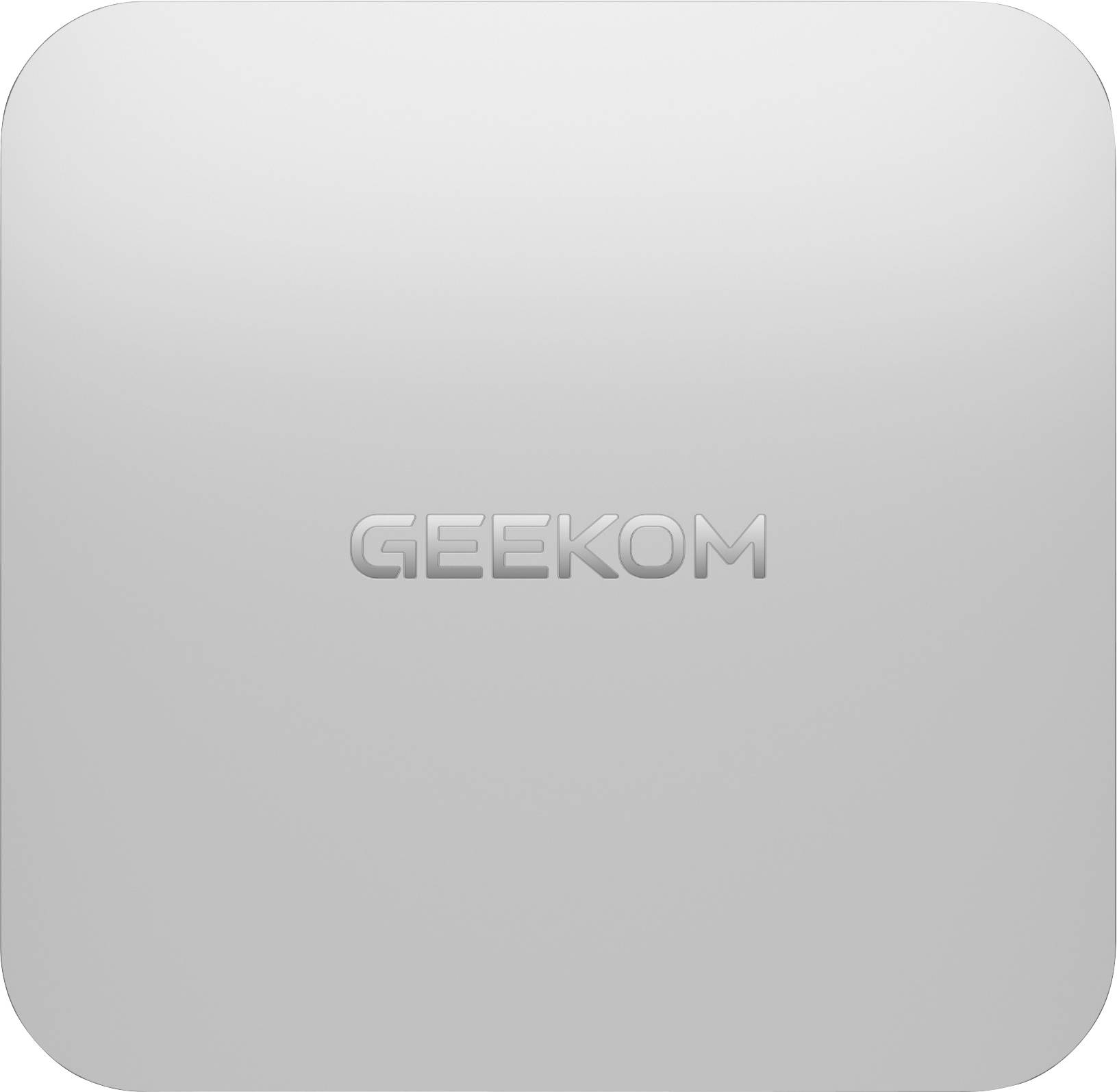 A square metallic surface with rounded edges featuring the embossed text 'GEEKOM' in the center.