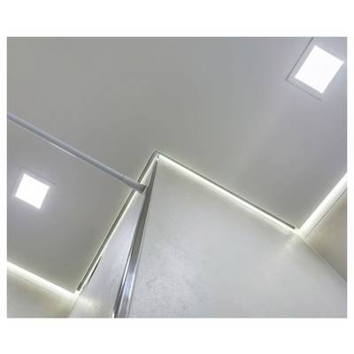 'Modern ceiling design with recessed lighting and a sleek white and metallic finish, creating a bright and contemporary ambiance.'