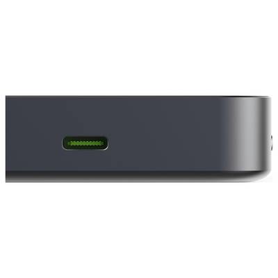 'Close-up of a dark-colored electronic device, showing a USB-C port on the side.'