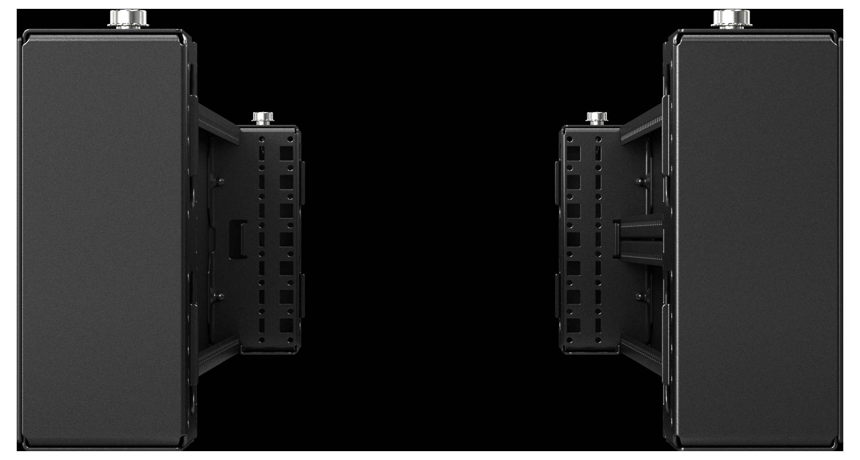 Two black, rectangular electronic devices mounted on a black background, facing each other. They appear to be similar, with connectors on top.