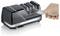 Electric knife sharpener in use, sharpening a knife blade. The device is black with silver accents, labeled 'GRAEF.'