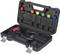 A toolbox containing a hydraulic crimping tool with black handles and color-coded dies. The case is open, showing compartments and secure latches.