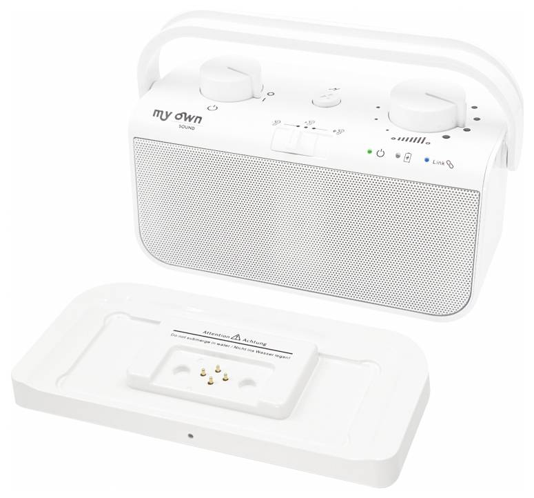 A white radio device with two dials on top, labeled 'My Own Sound,' and a detached battery pack with connection pins on a flat base.