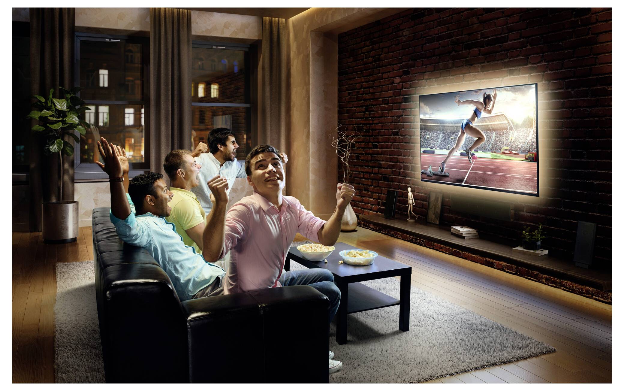 A group of five people on a couch cheer while watching an athletic event on a large TV in a cozy living room setting.