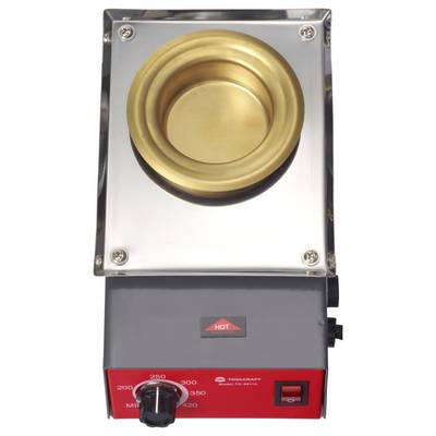 A small, tabletop electric crucible with a gold-colored interior, temperature control dial, red casing, and a 'HOT' warning indicator.