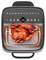 A roasted chicken inside an air fryer oven set at 200 degrees. The control panel displays various cooking icons and buttons.