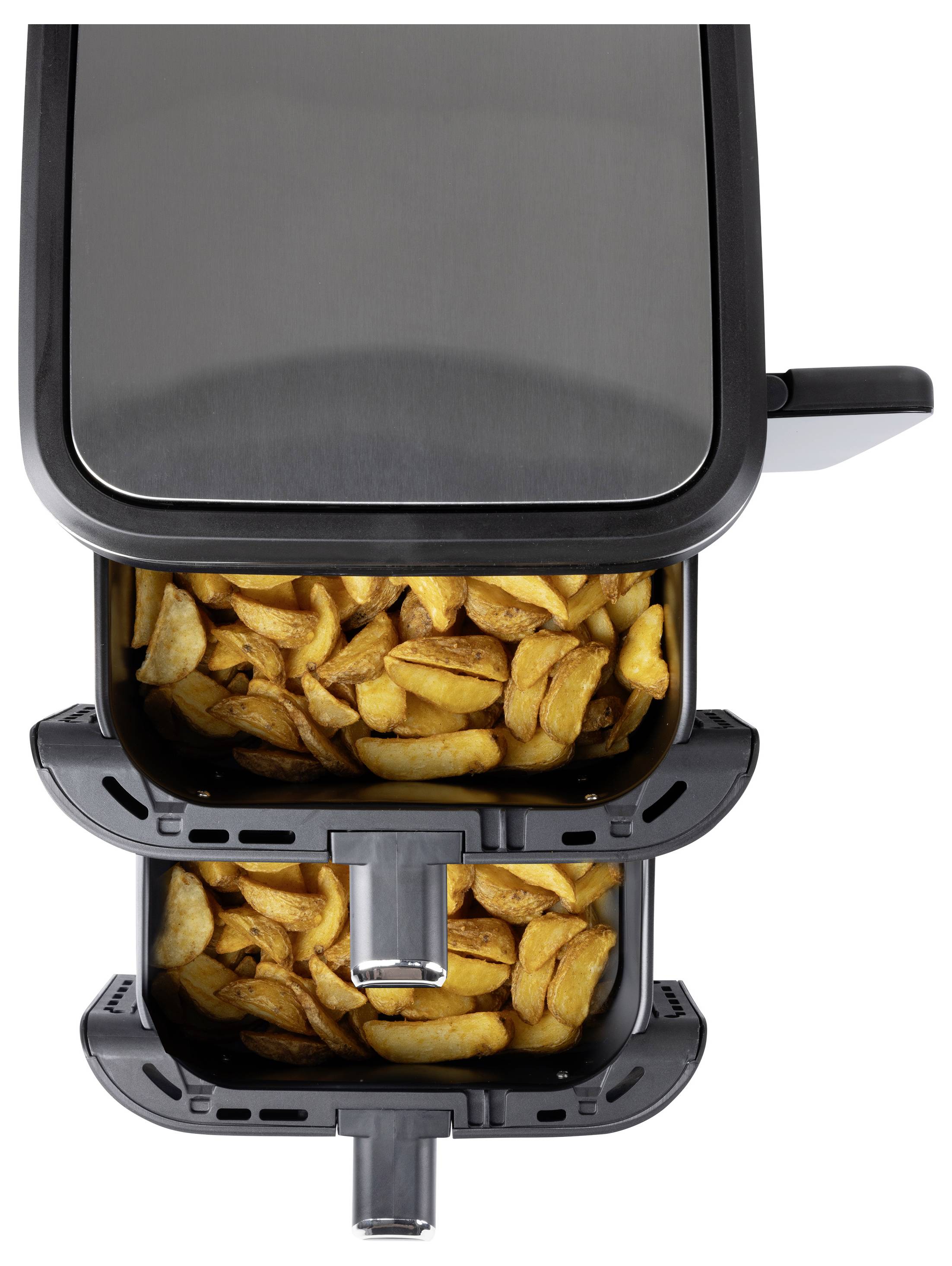 'Air fryer with a drawer open, filled with cooked potato wedges, highlighting the fryer's cooking capability.'