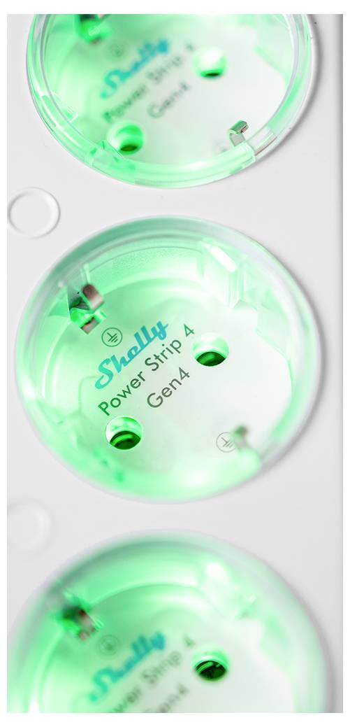 A close-up of a Shelly Power Strip Gen 4 with glowing green LEDs, showing electrical outlets designed for smart home use.