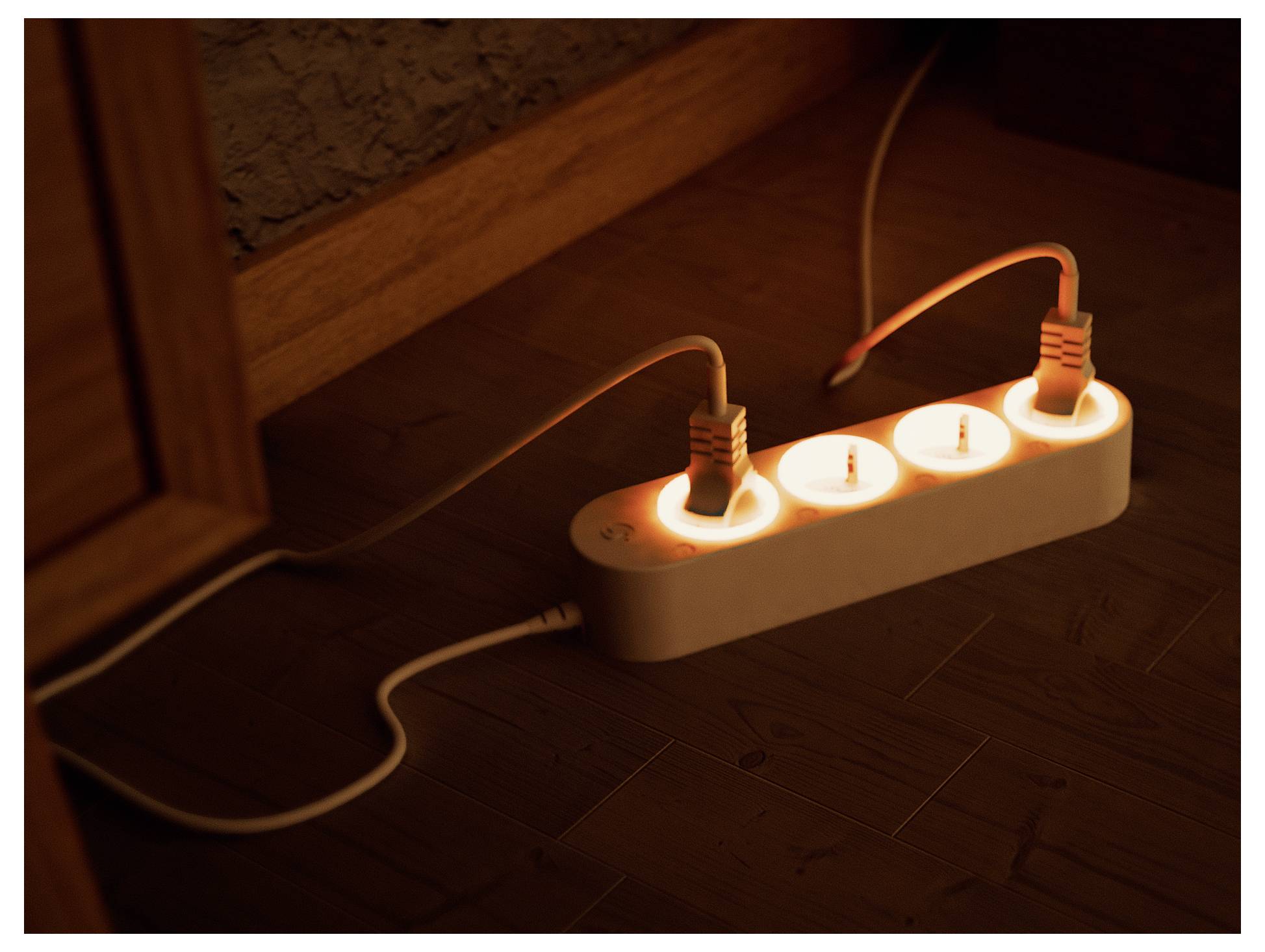 A power strip with three lit sockets is on a wooden floor, connected to two appliance cables, indicating active electrical use.