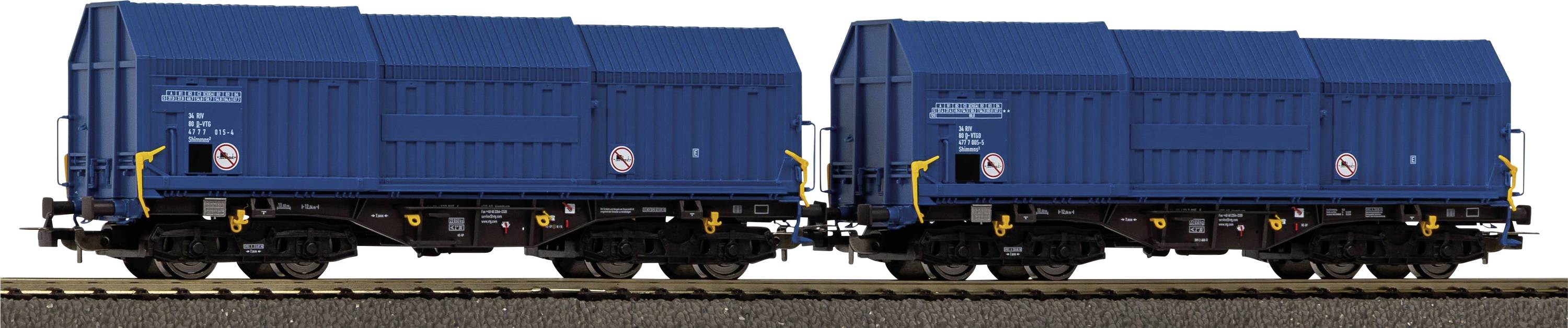 Two blue railway freight cars on tracks, featuring a no-smoking symbol on the side. The cars are designed for cargo transport.
