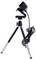 A compact camera mounted on a small, portable tripod with an adjustable head, shown with a connected USB cable for easy setup.