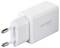 A white power adapter with two round metal prongs labeled 'Voltcraft UC-SW01.'