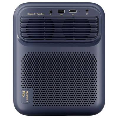 Portable black cube-shaped projector/speaker with perforated front, vents, handle strap, and side dock on a stand against a white background.