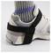 A close-up of a sneaker with an ankle support strap, showing a black strap securing a shoe to a gray sock, emphasizing mobility aid.