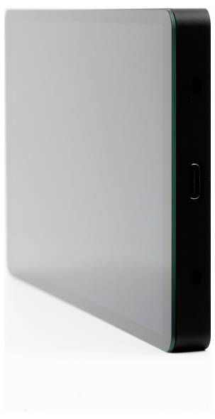 A slim, modern electronic device with a large screen, USB-C port, and smooth edges, standing upright on a white background.