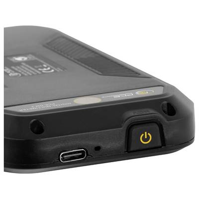 Close-up of a black electronic device corner with a USB-C port and yellow power button on a white background.