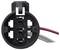 A close-up of a circular electrical connector with three visible metal pins, surrounded by a black plastic casing. Red, white, and black wires extend from the back.