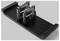 Three circuit boards stand upright in a black slotted rack or heat sink tray.