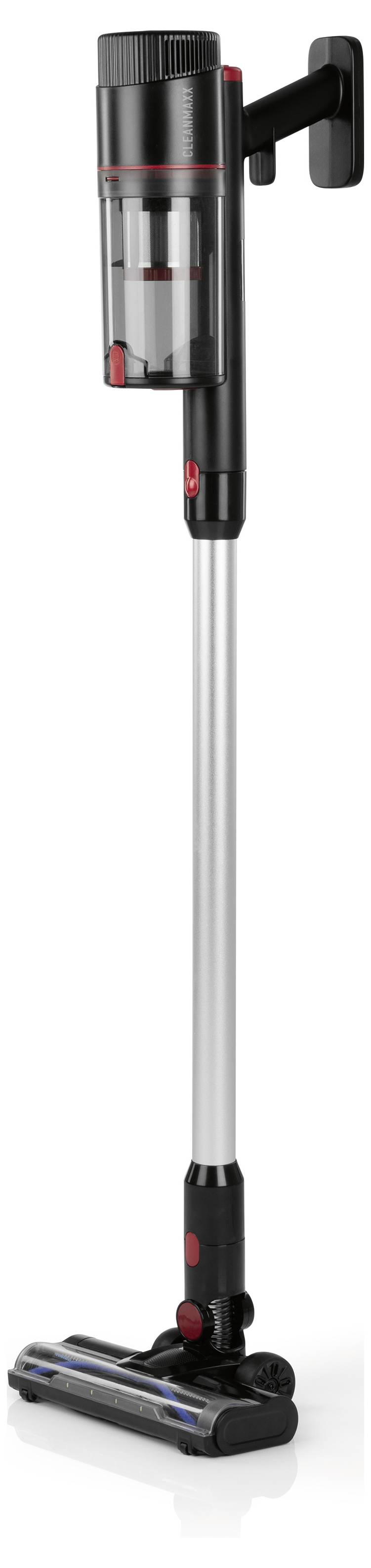 A sleek black cordless stick vacuum cleaner mounted on a wall stand, featuring a cylindrical dust bin and a slim metal handle.