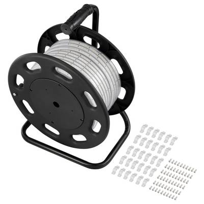 A black reel holding a coiled LED strip light, with a set of small mounting clips and screws laid out beside it on a white background.