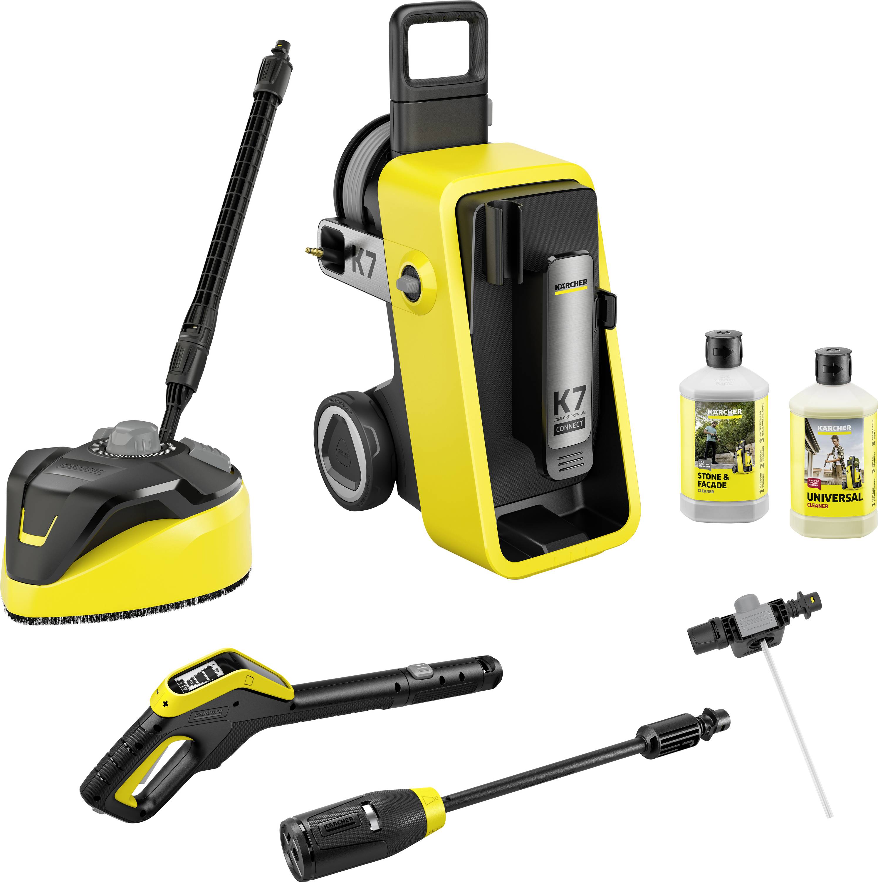 Pressure washer set with a yellow and black design, including a main unit, cleaning wand, rotating brush, and detergent bottles.