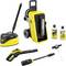 Pressure washer set with a yellow and black design, including a main unit, cleaning wand, rotating brush, and detergent bottles.