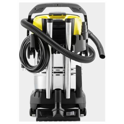 A commercial-grade vacuum cleaner with a robust design, featuring metal tubing, a yellow and black base, a large flexible hose, and storage compartments for attachments.