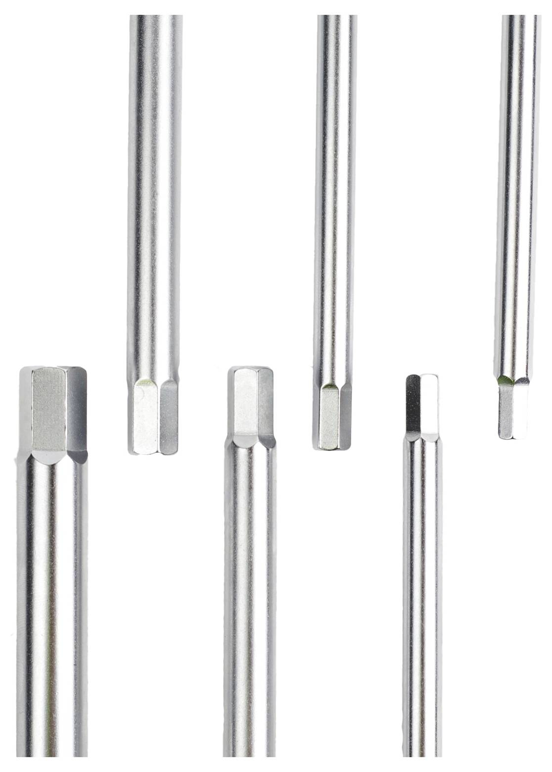 'Several metal hexagonal rods of varying lengths arranged vertically, showcasing their smooth, reflective surfaces and precise edges.'