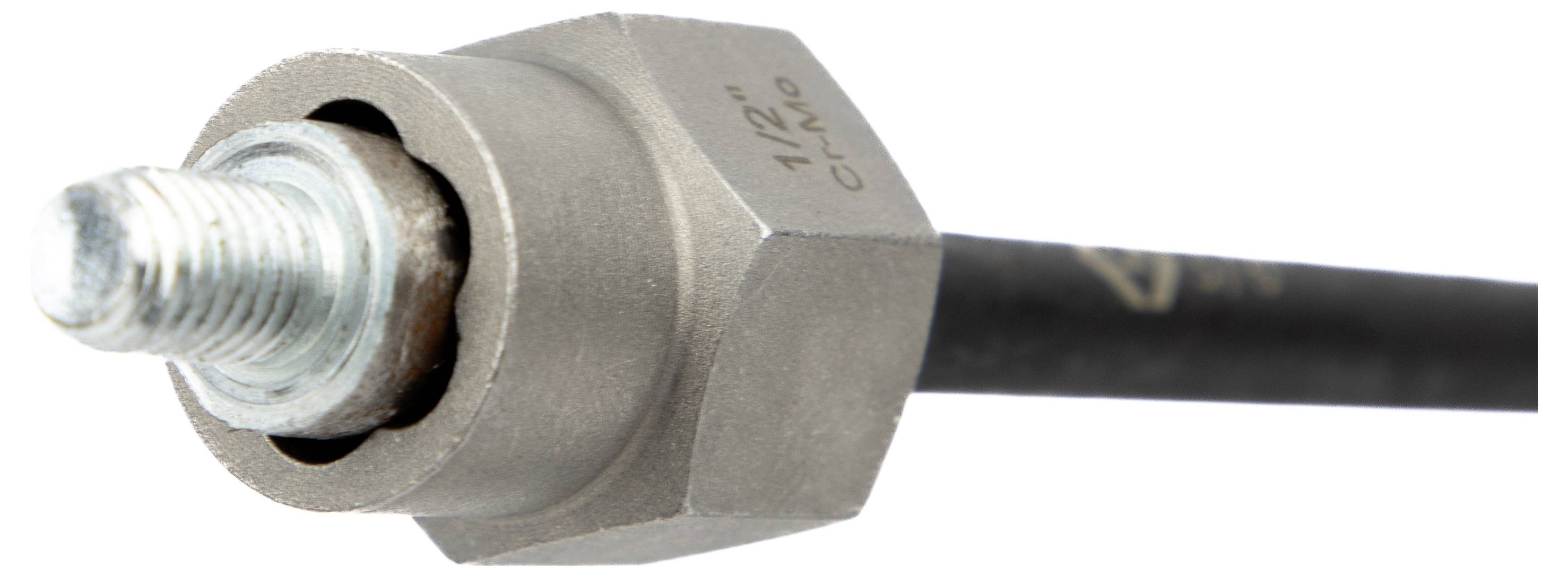 A metal hex nut with '1/2 CR-MO' marked on its side, attached to a threaded bolt. The bolt is connected to a black bar or rod.