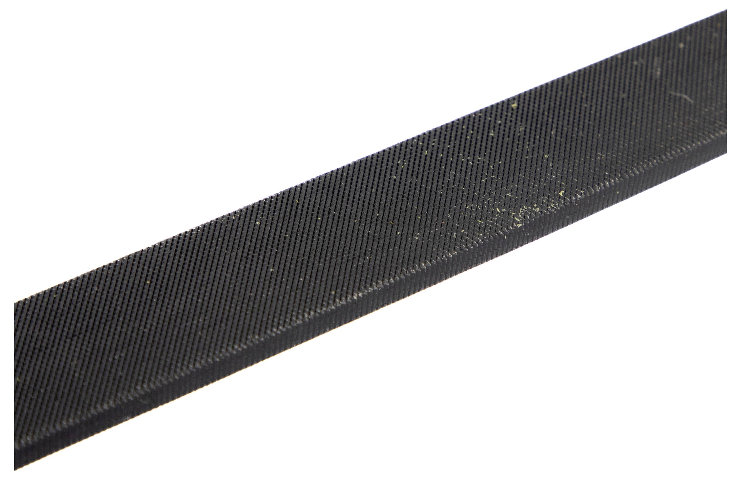 A close-up image of a black, textured strip with diagonal grooves, possibly a sanding tool or file edge.