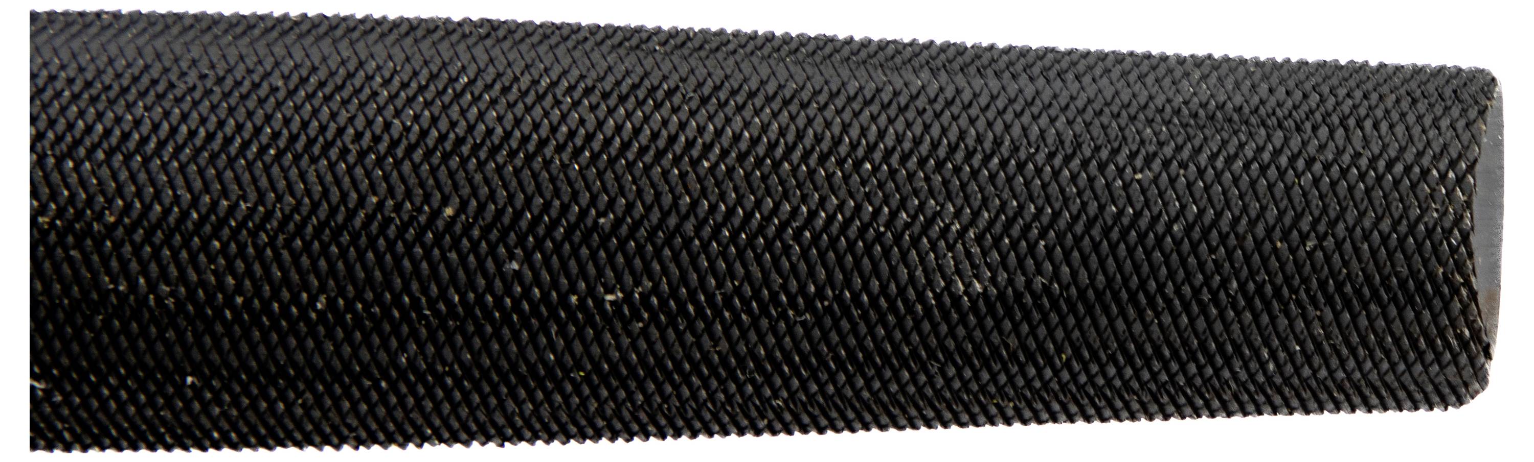 A close-up view of a textured, cylindrical object with a fine, crosshatch pattern, resembling a tool handle or grip.