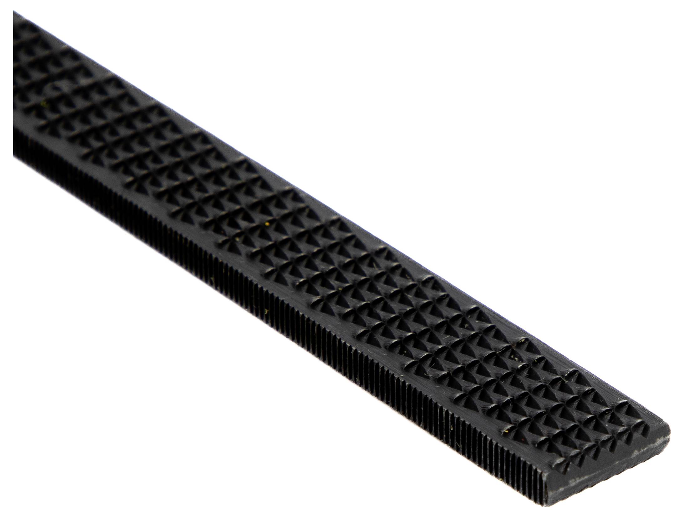 A black rectangular metal file with a textured surface, used for filing and shaping materials.