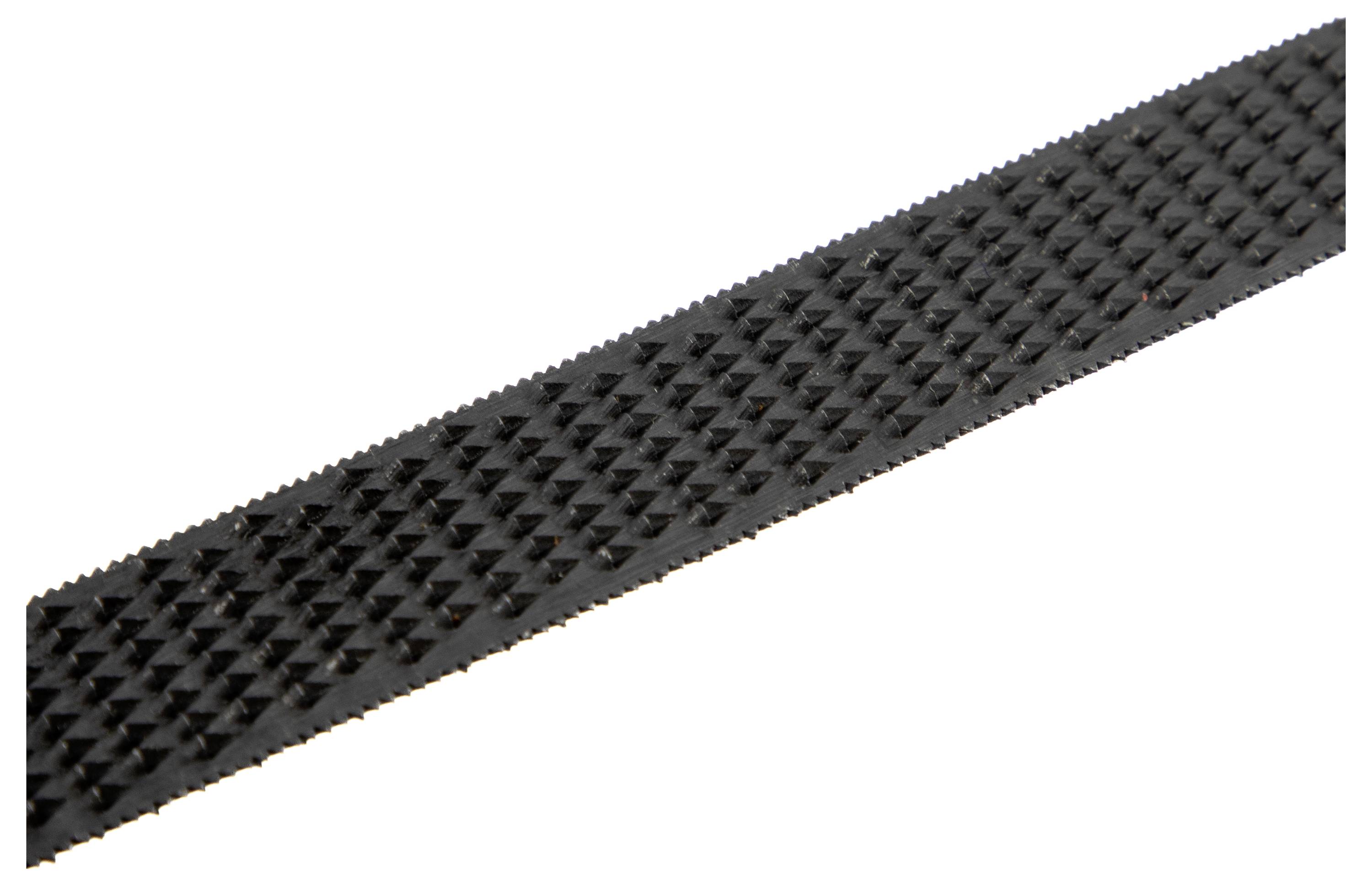A close-up view of a textured, black serrated belt.