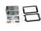 Assorted metal radio installation parts and mounting frames, including a silver chassis box, brackets, screws, and two black faceplate frames on a white background.