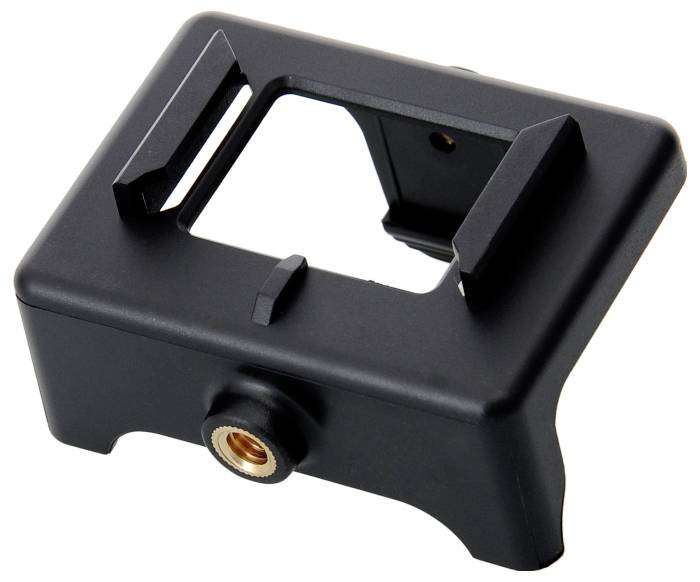 A black metal hot shoe adapter with a tripod mount, used for attaching accessories to cameras.