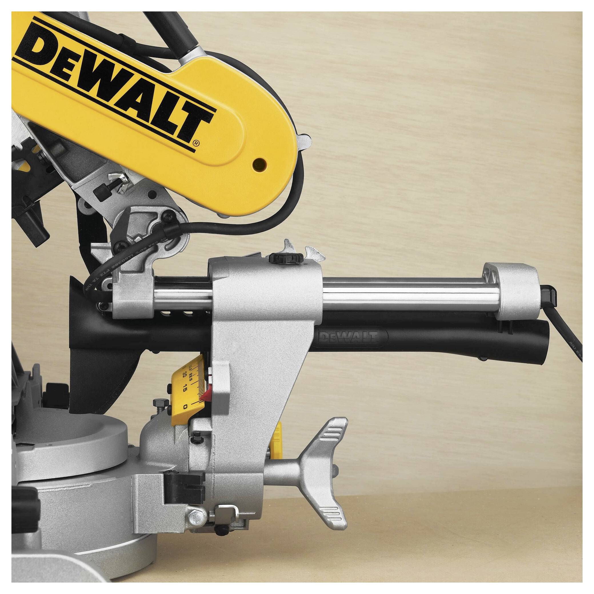 A DEWALT miter saw showing its blade, motor, and handle, positioned against a neutral background.