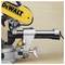 A DEWALT miter saw showing its blade, motor, and handle, positioned against a neutral background.