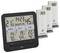Digital thermometer displays indoor and outdoor temperatures, time, and humidity levels. Three remote sensors show different area readings.