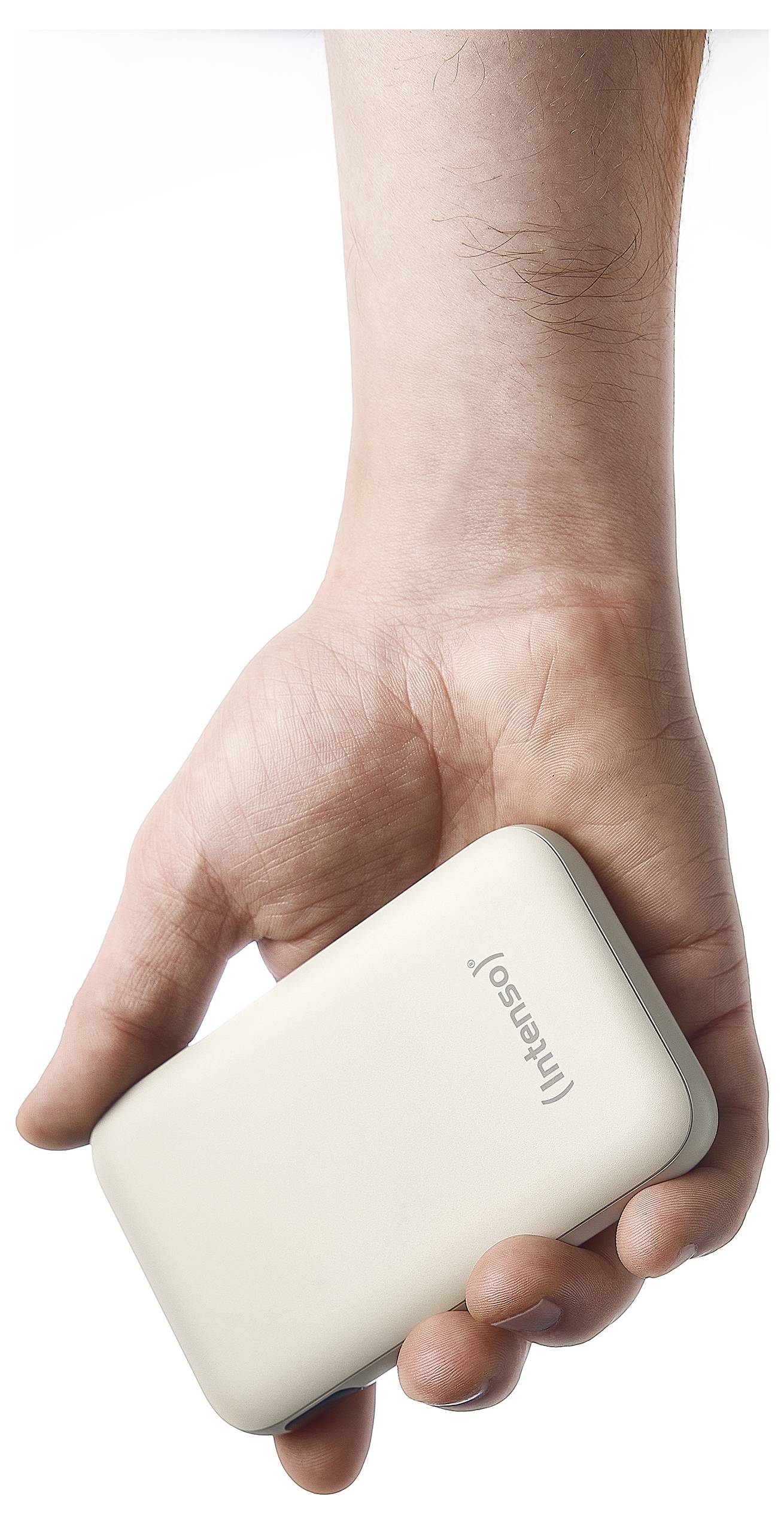 A person's hand holding a small rectangular external hard drive, branded 'Intenso', with a white and gray color scheme.