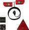 'Tail light kit with two red lights, wiring, mounting hardware, and reflective triangle for trailers or vehicles.'