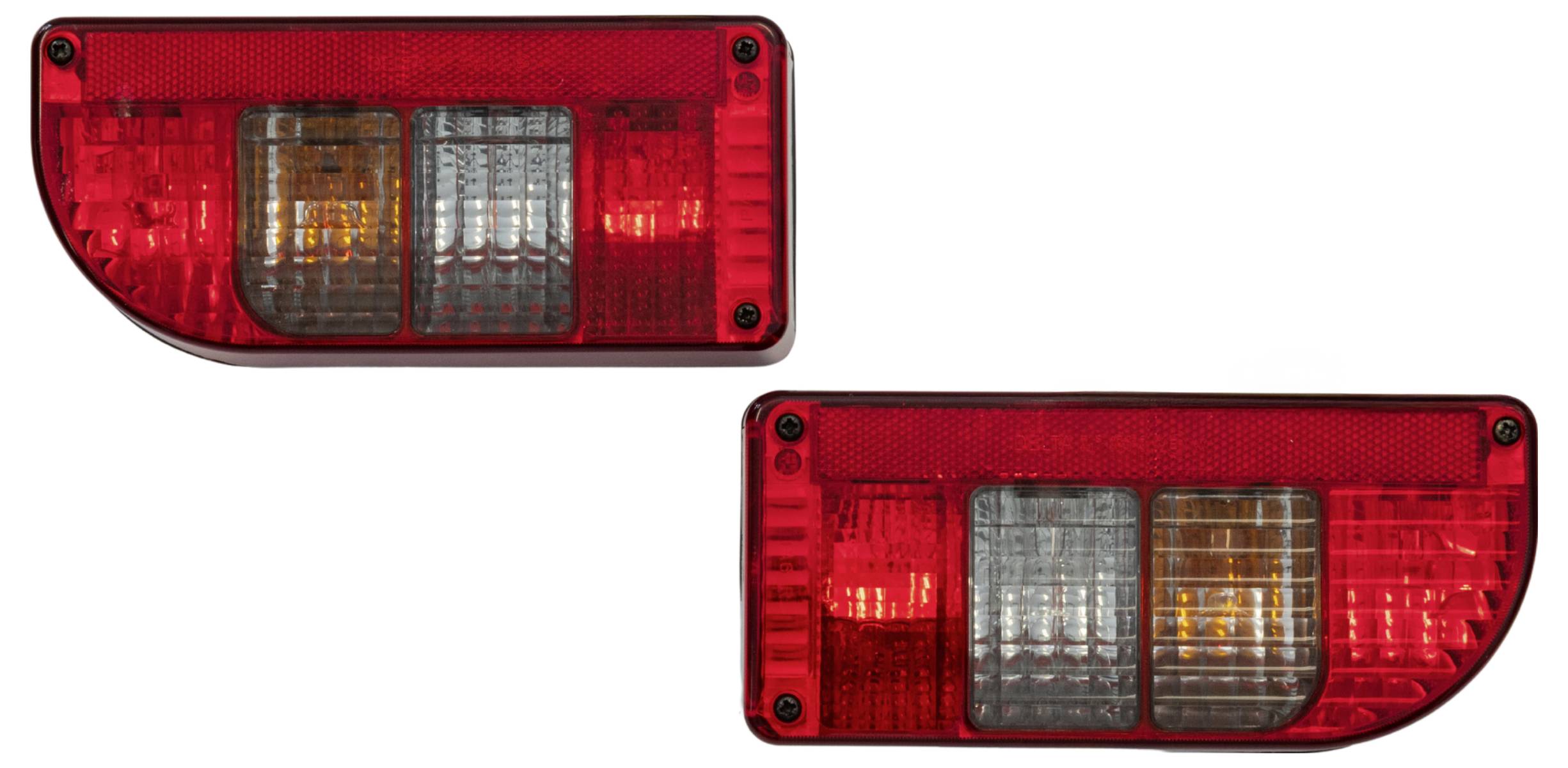 Two rectangular red car tail lights with visible amber and white sections. Positioned side by side, one slightly above the other.