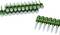 'Green plastic-collated nails arranged in two rows, one with fourteen and the other with seven nails, angled for construction use.'