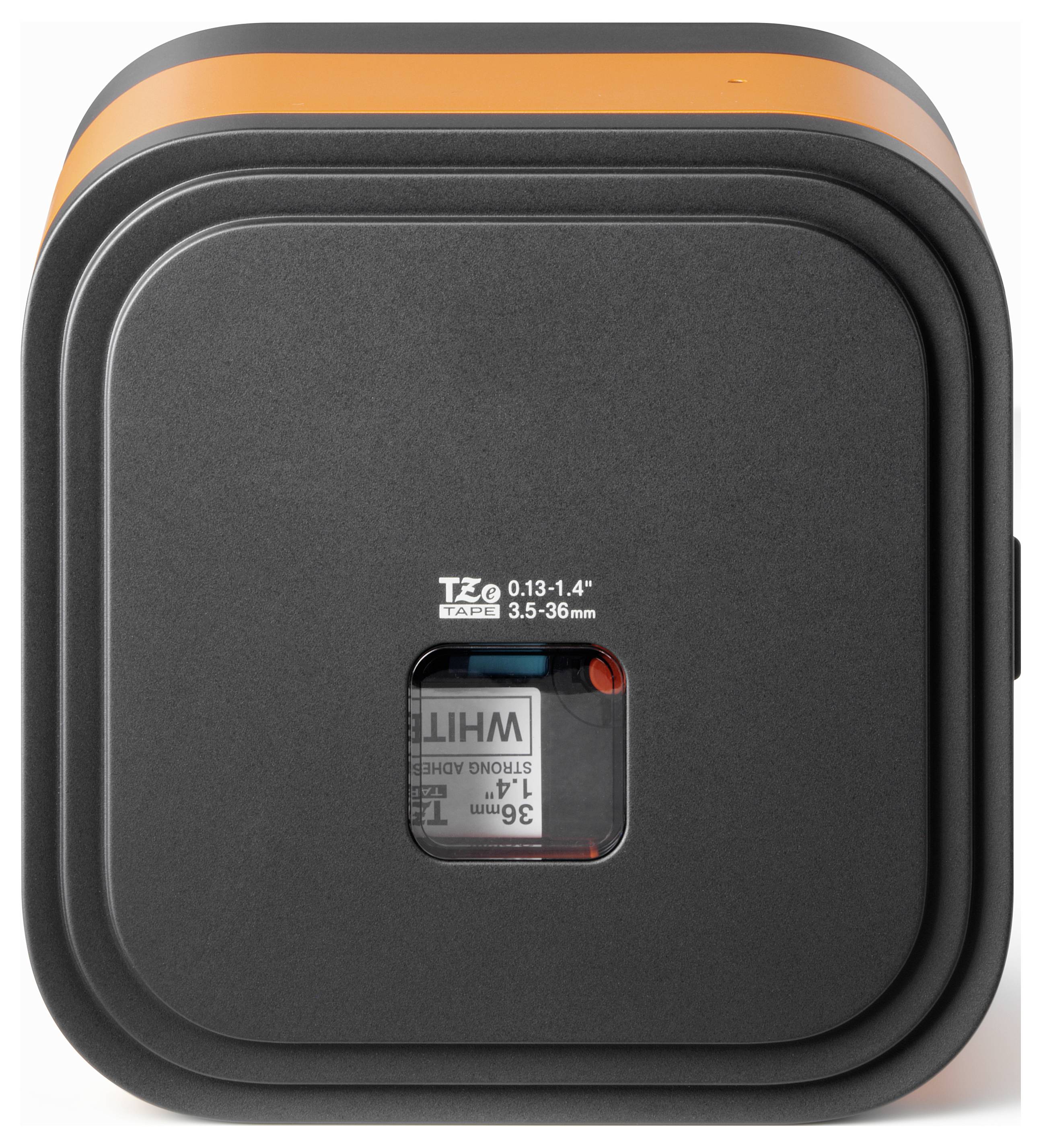 A close-up of a black and orange device with a lens indicated by 'T2.9 0.13-1.4'. A small window shows internal components and a label.