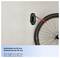 Bicycle wheel mounted on a wall hook. Text below reads 'Reifenhöhe bis 80 mm, Reifenbreite bis 90 mm, Tyre height up to 80 mm, Tyre width up to 90 mm'.